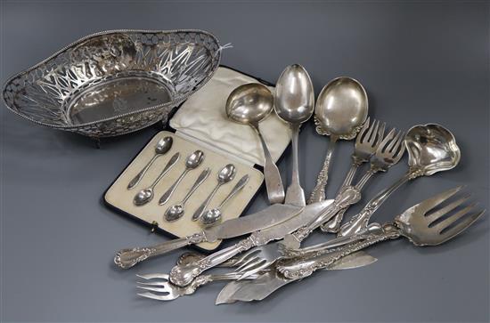 A Dutch pierced white metal oval basket, a quantity of sterling flatware, cased set of teaspoons, a 19th century silver tablespoon etc.